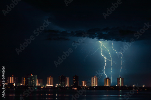 Thunderbolt and Lightning.night thunderstorm over the buildings in the city