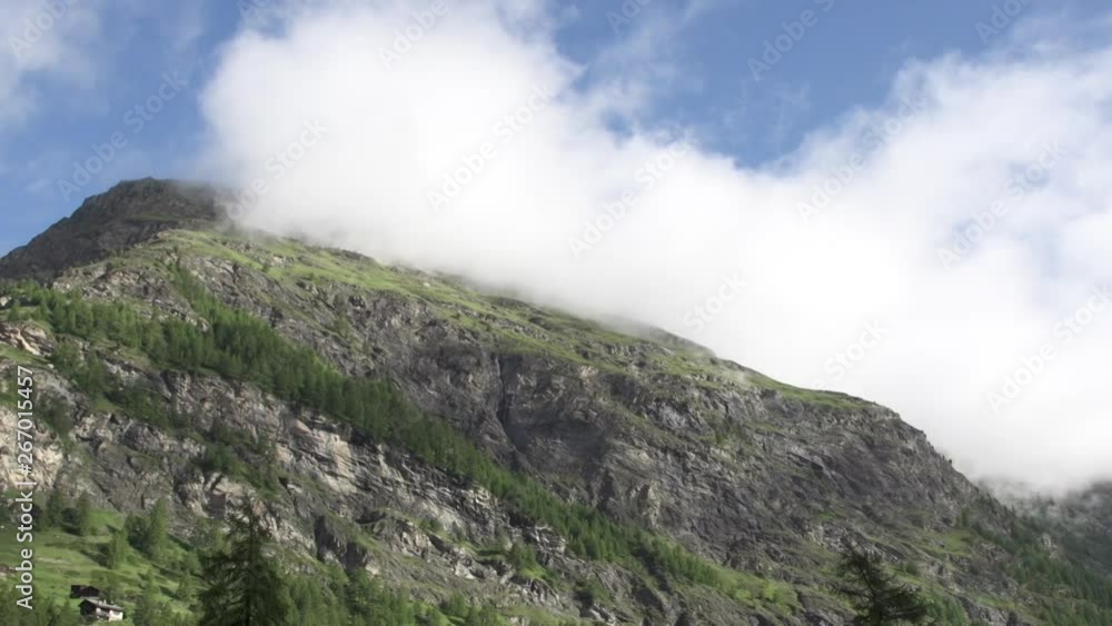 Majestic mountain covering with cloud Majestic mountain covering with cloud