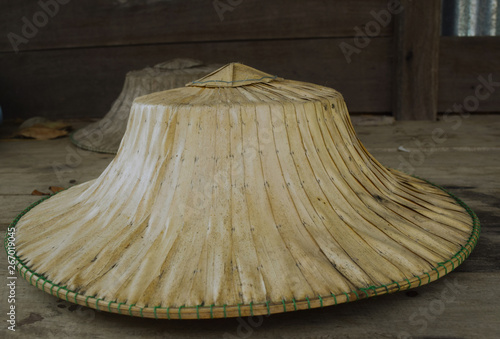 The hat is woven from dry leaves.