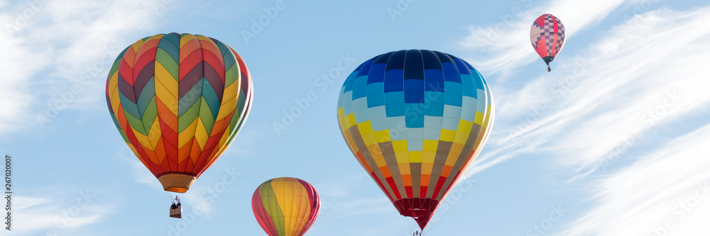 Naklejka premium Colorful hot air balloons in blue sky