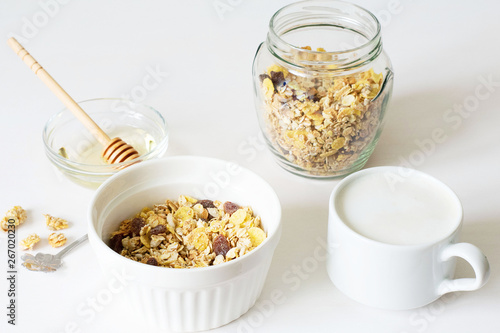 Healthy breakfast. Fresh granola on a white background © newrita