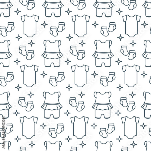 Seamless pattern with baby clothes.