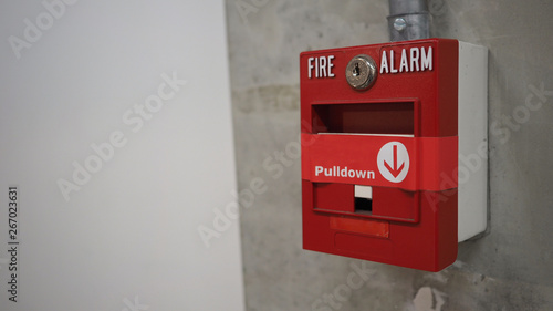 Emergency of Fire alarm or alert or bell warning equipment in red color. AT the building for safety.