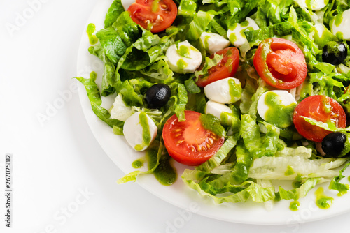 greek salad with mozzarella and pesto