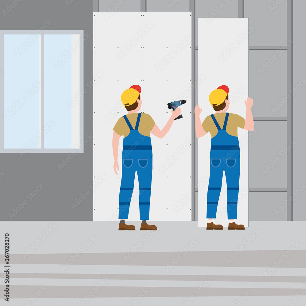 Fotografie Workers, installing gypsum plasterboard panels with a screwdriver in the interio