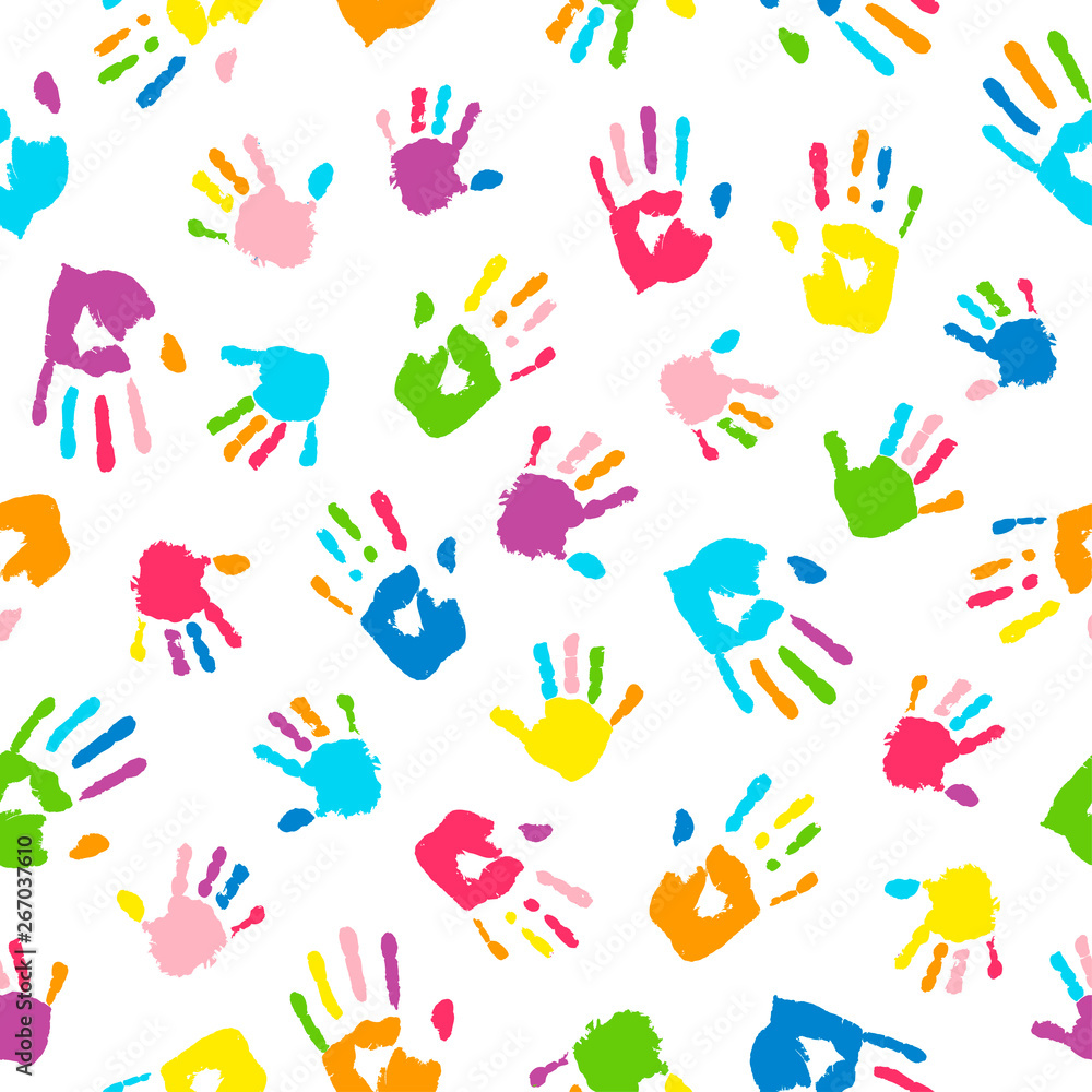 Fototapeta premium Seamless background made from colorful handprints. Palms and fingers colored in rainbow colors. Multicolor pattern for your design.