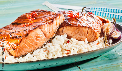 Gourmet salmon steaks on a bed of rice