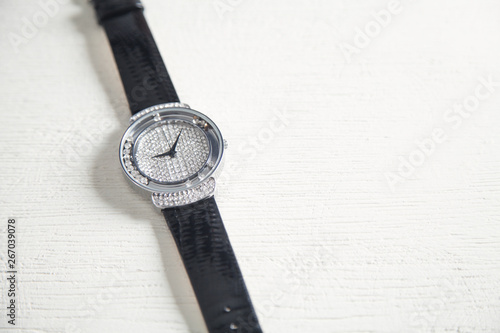 Wrist Watch for woman on white desk.