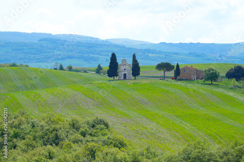 The landscape of Val d Orcia with the church of Vitaleta in the background. Hills of Tuscany. Val d Orcia landscape in spring