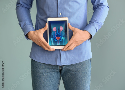 Man holding tablet computer...