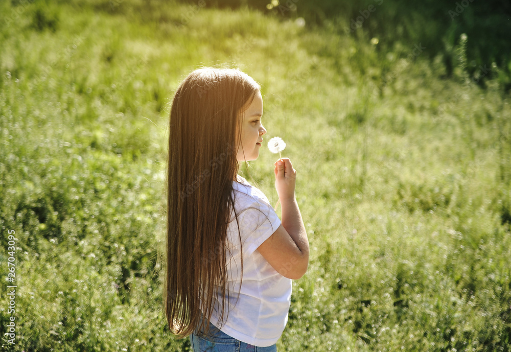 Cute girl with dandelion outdoor. Cute girl with dandelion outdoor.