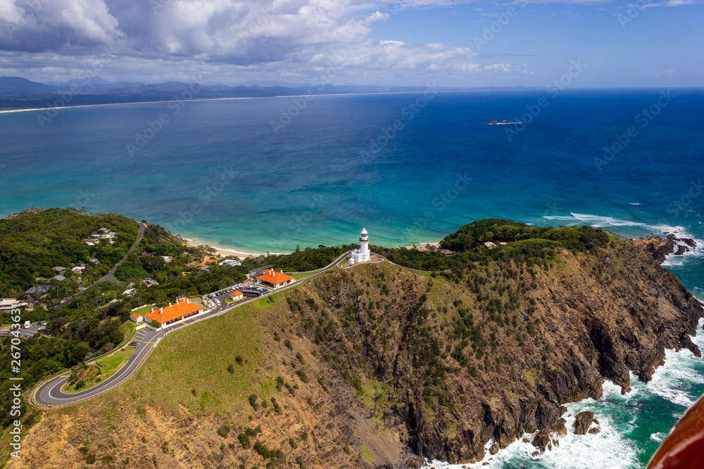 Naklejka premium aerial view of Wategoes Beach at Byron Bay with lighthouse. The Photo was taken out of a Gyrocopter, Byron Bay, Queensland, Australia