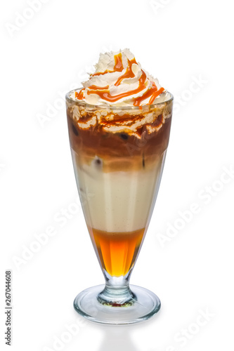 Cocktail with coffee, caramel syrup and whipped cream isolated on white