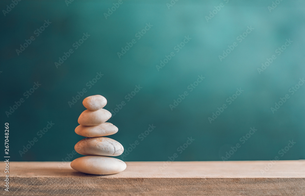Balanced stones On the wood