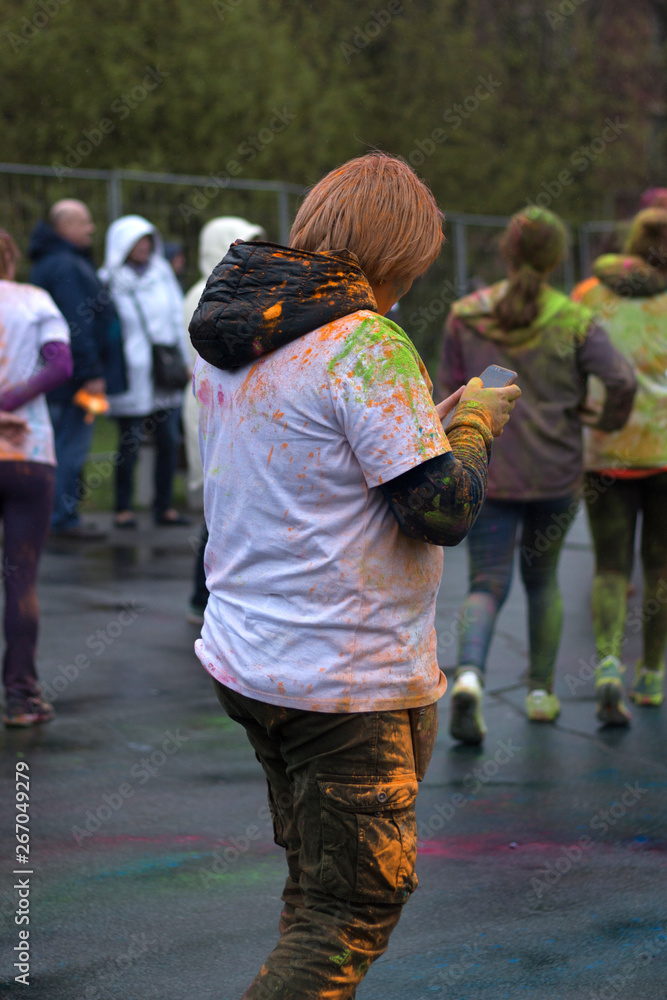 St. Petersburg, RUSSIA -2 May, 2019: People celebrating Colors Holi festival. Beautiful happy young people. Holi india design concept. St. Petersburg, RUSSIA -2 May, 2019: People celebrating Colors Holi festival. Beautiful happy young people. Holi india design concept.