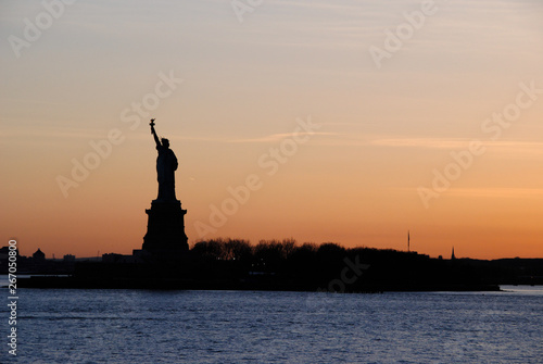 Amazing view of the Statue of Liberty  at sunset