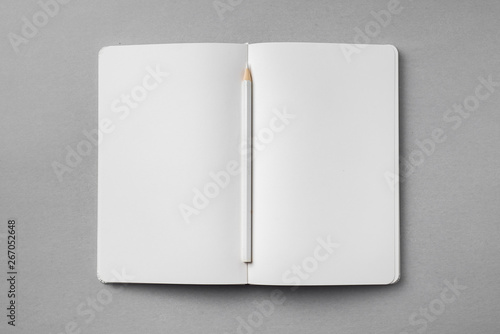 white notebook isolated on grey background