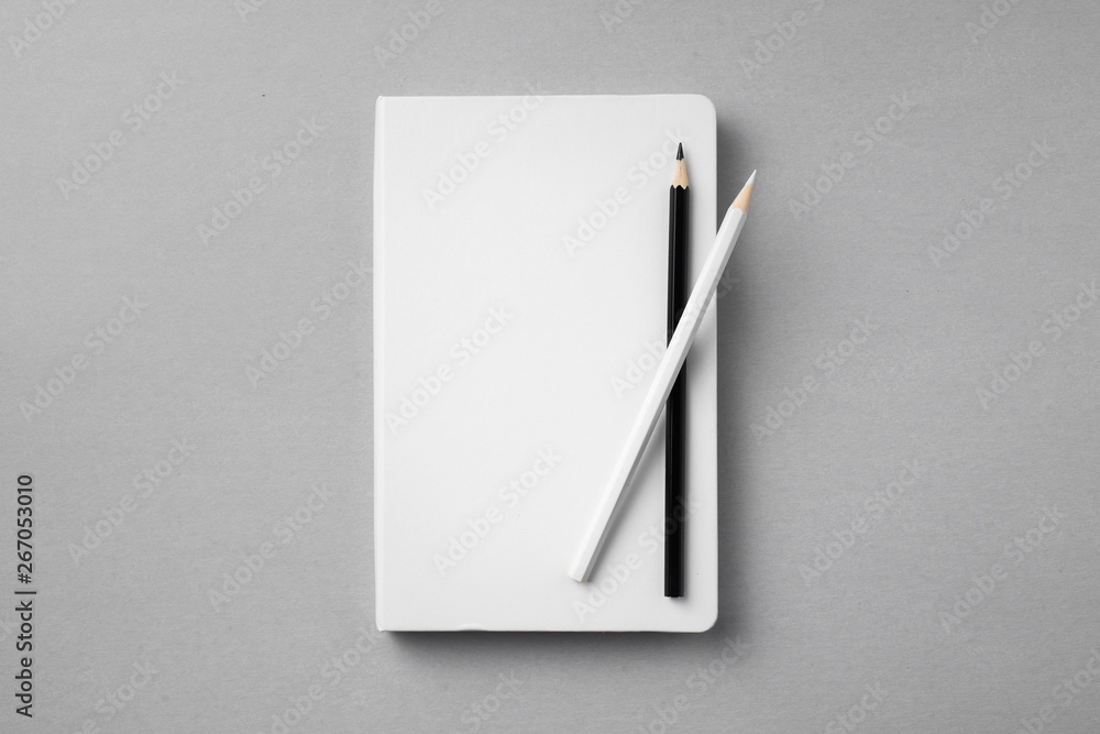 white notebook isolated on grey background white notebook isolated on grey background