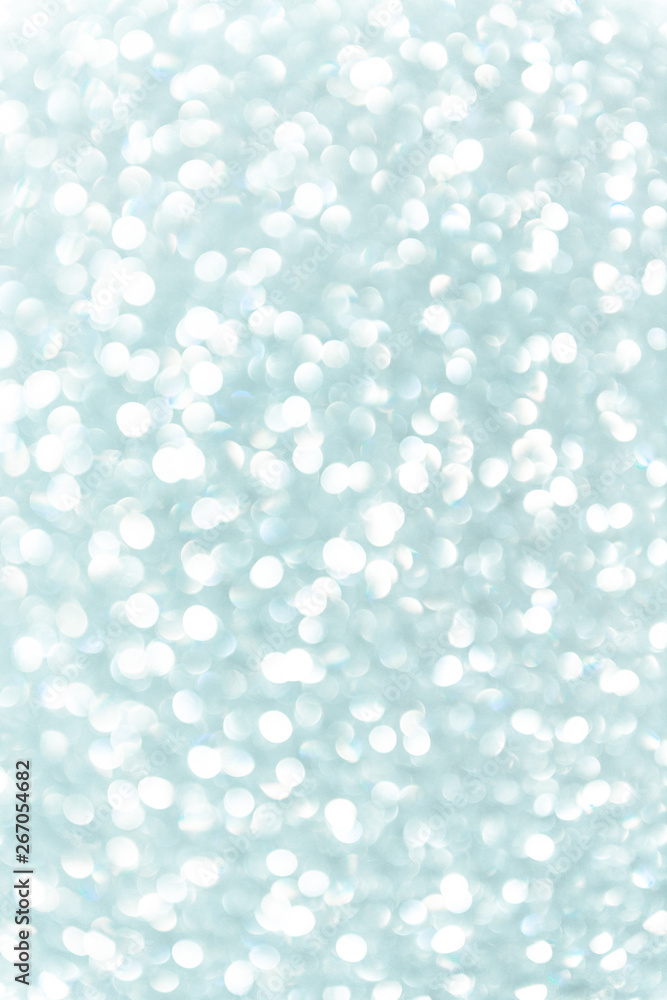 Abstract cold white blurry background with bokeh circles