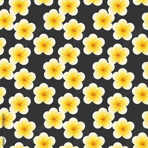 Seamless Plumeria flowers. Beautiful tropical jungle fabric pattern background