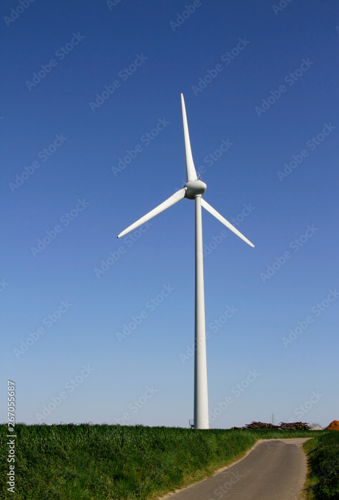 Wind turbine against a blue sky Wind turbine against a blue sky