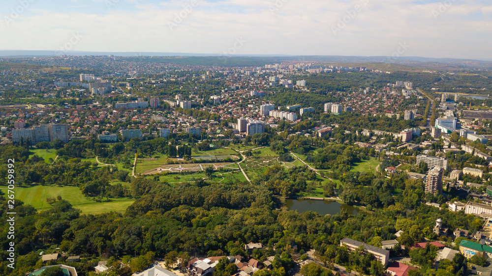 Aerial shot of a park in Chisinau City. Blue sky with clouds. Botanica, Chisinau, Moldova