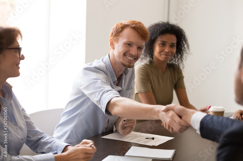 Fotografie Business partners handshake get acquainted at meeting