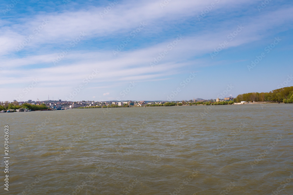 Danube River near Tulcea, Romania. Here begins the biosphere reserve Delta of the Danube. Walk with a small cruise ship.