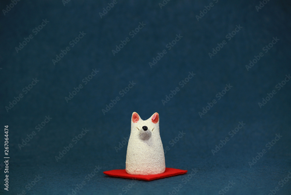 Still life photo of Japanese white fox figurine Still life photo of Japanese white fox figurine