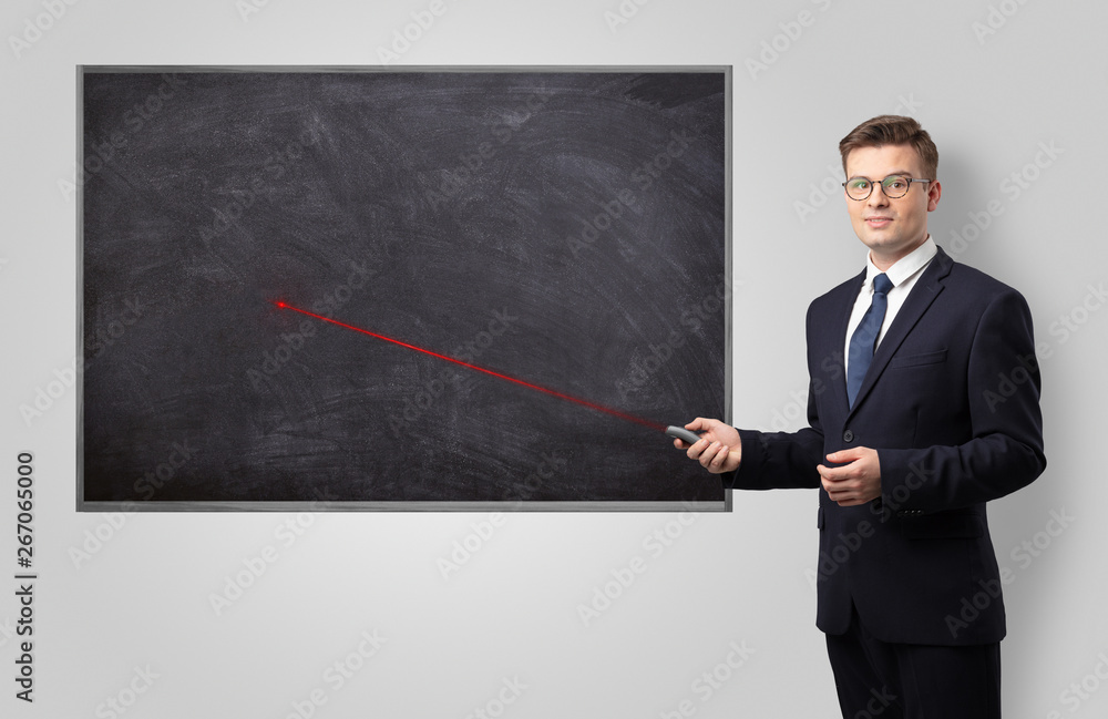 Handsome young teacher with laser pointer teaching
Handsome young teacher with laser pointer teaching
