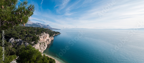 Panorama landscape over hidden beach on sunny day