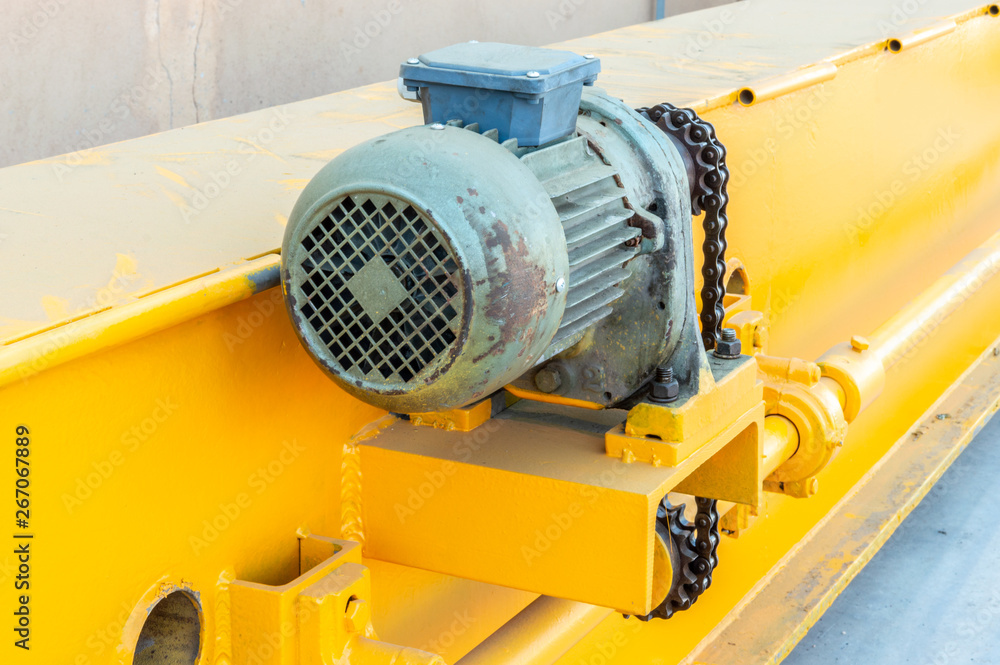 Parts of a bridge crane ready for installation in the industrial plant.