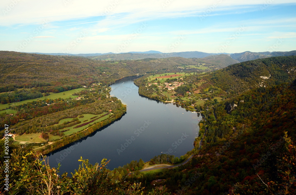 Aerial panoramic view on Ain River in France surrounded by autumn forest. Aerial panoramic view on Ain River in France surrounded by autumn forest.