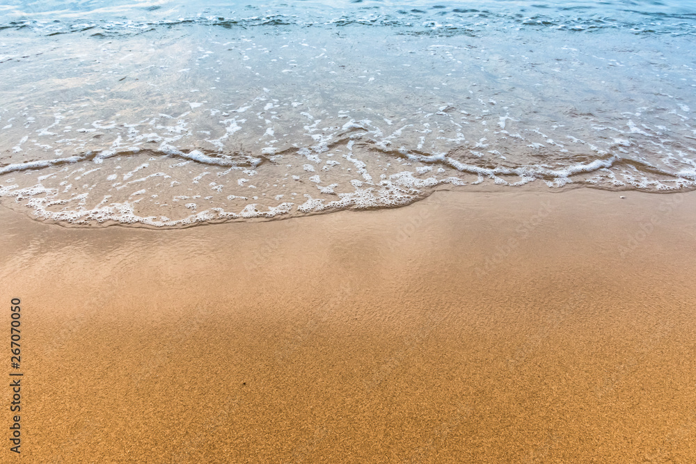 Soft wave of blue ocean on sandy beach. Soft wave of blue ocean on sandy beach.