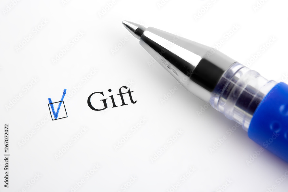 Gift. Filling in the questionnaire, documents. The checkboxes are filled with a black pen on a white background. Questionnaire, survey. Gift. Filling in the questionnaire, documents. The checkboxes are filled with a black pen on a white background. Questionnaire, survey.