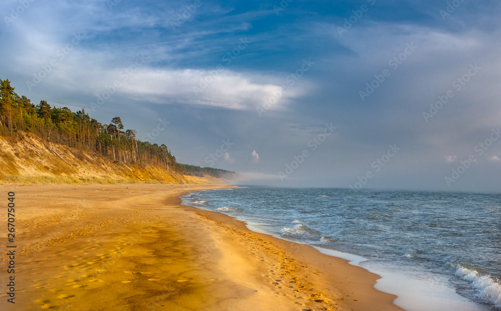 evening lights with coming fog in the Baltic Sea near Jurkalne, Ugale, Latvia 