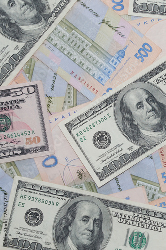 Wallpaper Mural Money, dollars and hryvnia, close-up, top view. Concept of the dollar in relation to the hryvnia, finance, banks. Torontodigital.ca