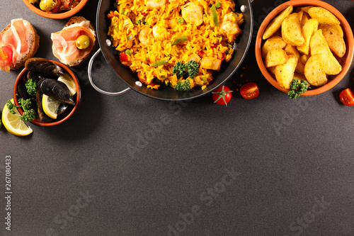 Fototapeta Naklejka Na Ścianę i Meble -  selection of spanish meal with paella, tapas, mussel