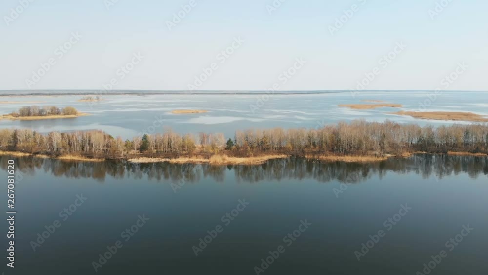 Aerial shooting, flying over the river with the island Aerial shooting, flying over the river with the island