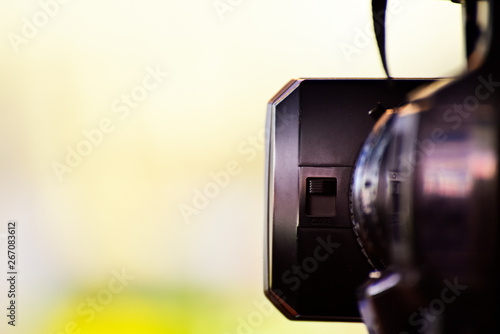 Photography Video journalist capturing moving picture by camcorder in a event