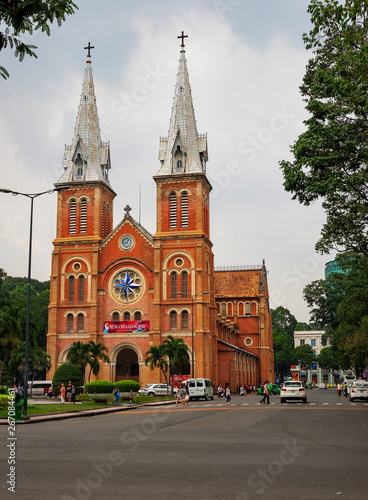 HO CHI MINH, VIETNAM - 25.12.2016. Notre Dame Cathedral (Vietnamese: Nha Tho Duc Ba) in sunny day. Build in 1883 in Ho Chi Minh city, Vietnam. HO CHI MINH CITY (SAI GON)