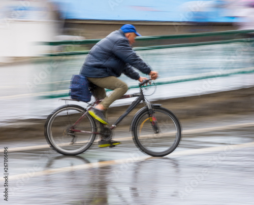 Cyclist on the city roadway in motion blur