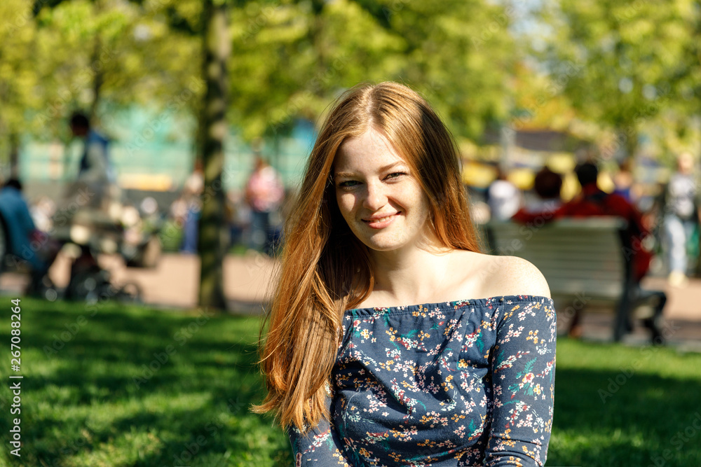 Young woman in the summer park Young woman in the summer park