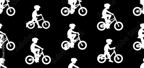 Seamless pattern with Boys riding bike. isolated on black background