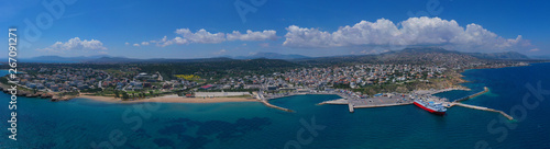 Aerial drone bird's eye panoramic view of famous port and city of Rafina with passenger ferries travel to Aegean islands, Attica, Greece © aerial-drone
