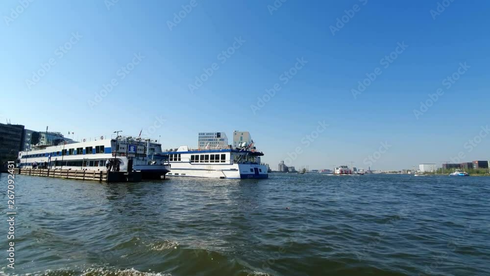 Ferries standing at the pier in Amsterdam, Transport connecting the Central and Northern part of Amsterdam Ferries standing at the pier in Amsterdam, Transport connecting the Central and Northern part of Amsterdam