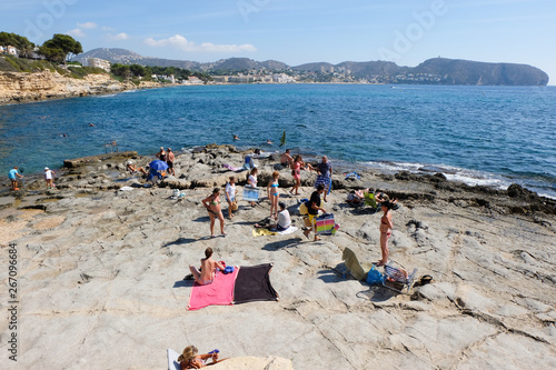 Moraira, Alicante, Spain. September 14, 2014. View of Cala L' Andragó full of bathers who come to bathe in its clean waters