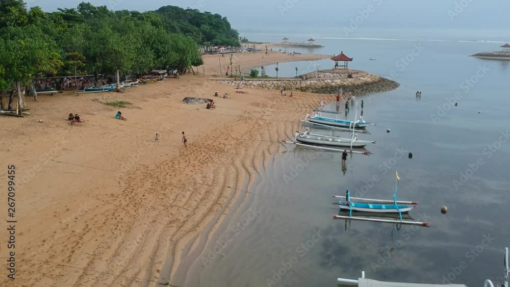 Aerial view from Karang Beach Sanur Bali with beautiful white sand and traditional Balinese boats Aerial view from Karang Beach Sanur Bali with beautiful white sand and traditional Balinese boats