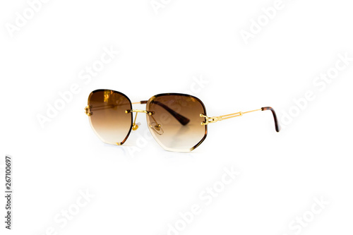 Rimless frame hexagonal shape gradient brown sunglasses at isolated white background, side view