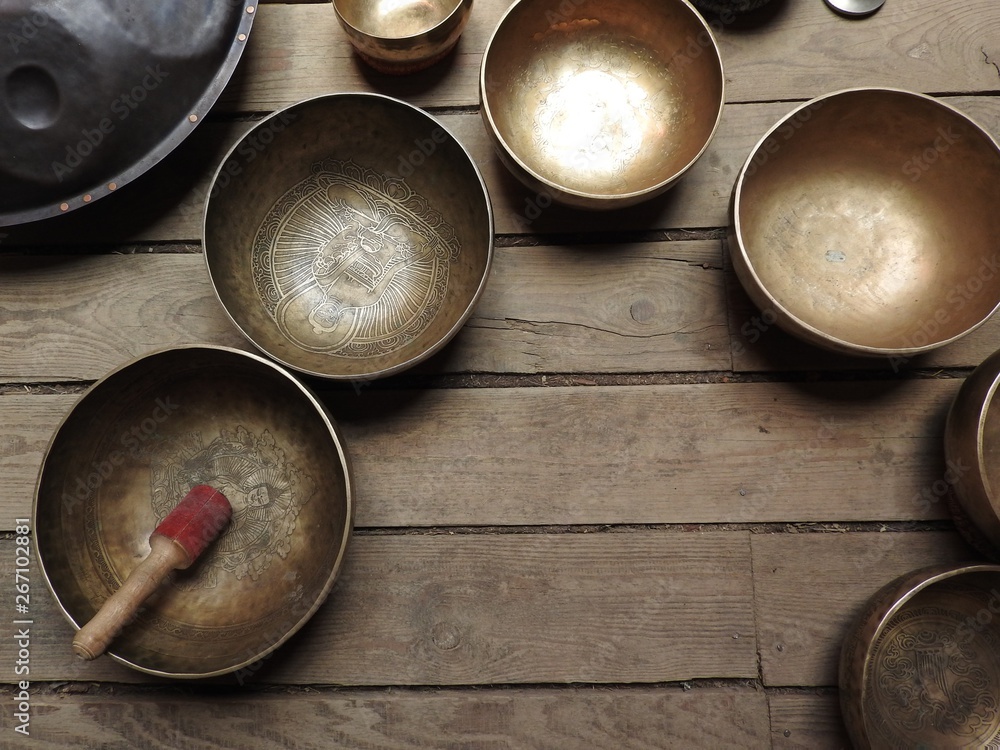 Tibetan singing bowl and other religious ritual instruments for meditation.